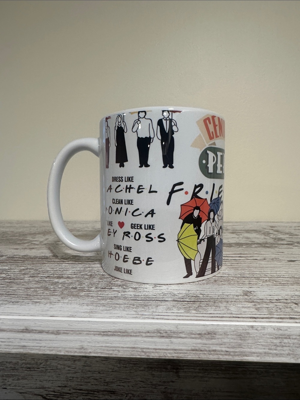 White Ceramic TV-Inspired Character Quote Mug with Colorful Umbrellas